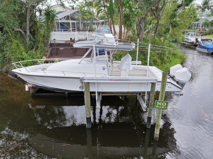 Hurricane Boat Lift Palm City, Florida With Piles Thumbnail